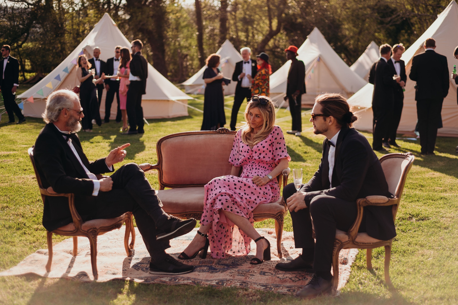 Stretch tent wedding reception with festoon lighting
