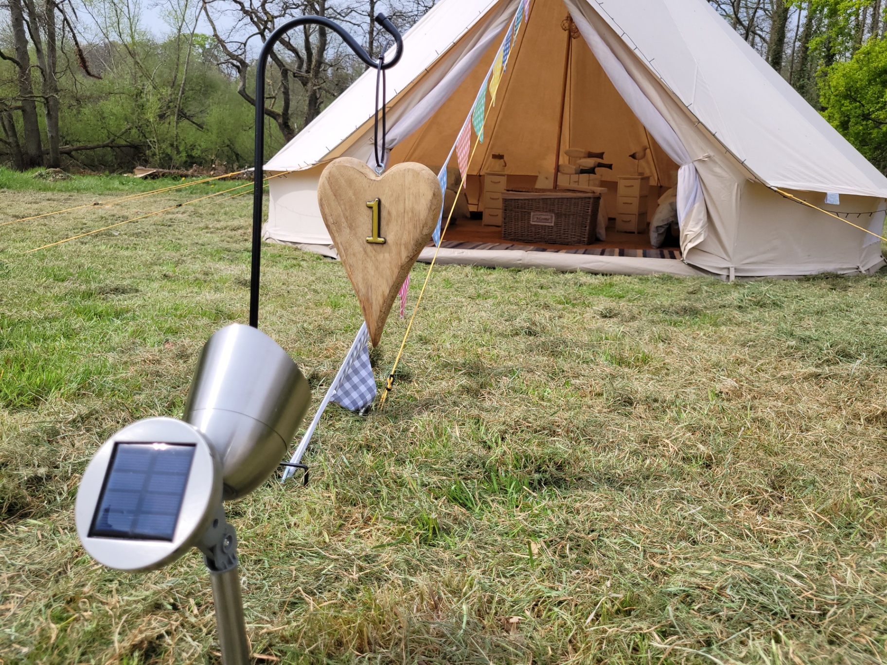 Bell tent with bunting and solar light